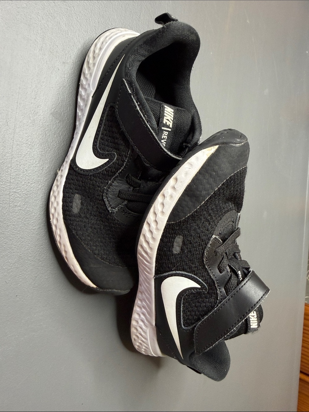 Nike Kid’s Revolution - Black and White Hook-and-Loop Sneakers. Kid’s Size: 12